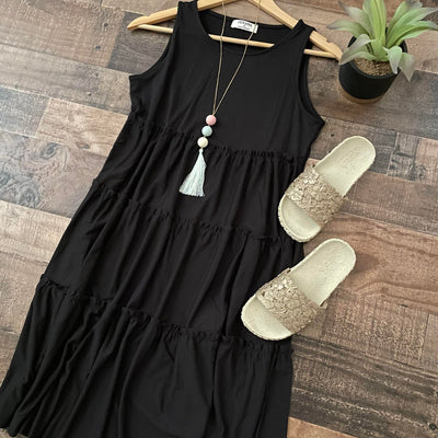 Charmingly Cute: Sleeveless Tiered Black Dress for Effortless Style